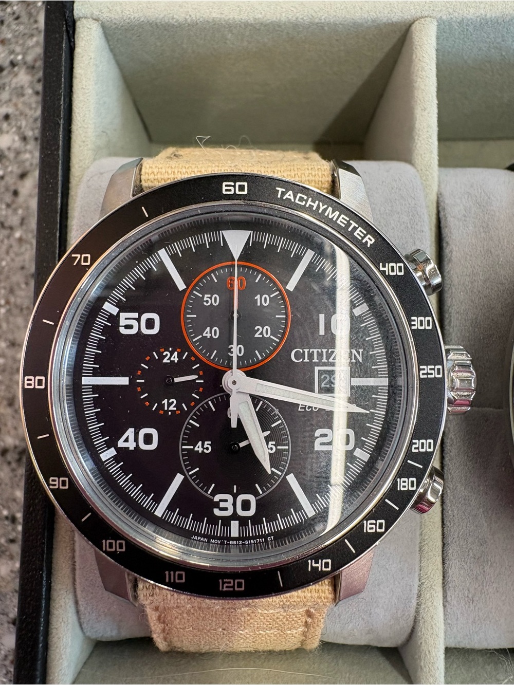Citizen Black Dial Chronograph Watch with Beige Strap and Orange Accents
